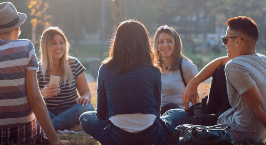 Young people in park a863ae63a45742ddd8cead629771a539